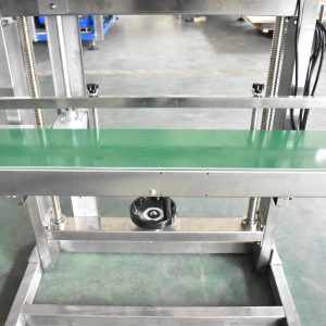 Soudeuse à bande AS600F : table de convoyeur et manivelle de réglage de la hauteur